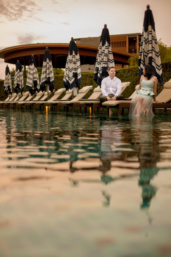 Romantic sitting on the pool